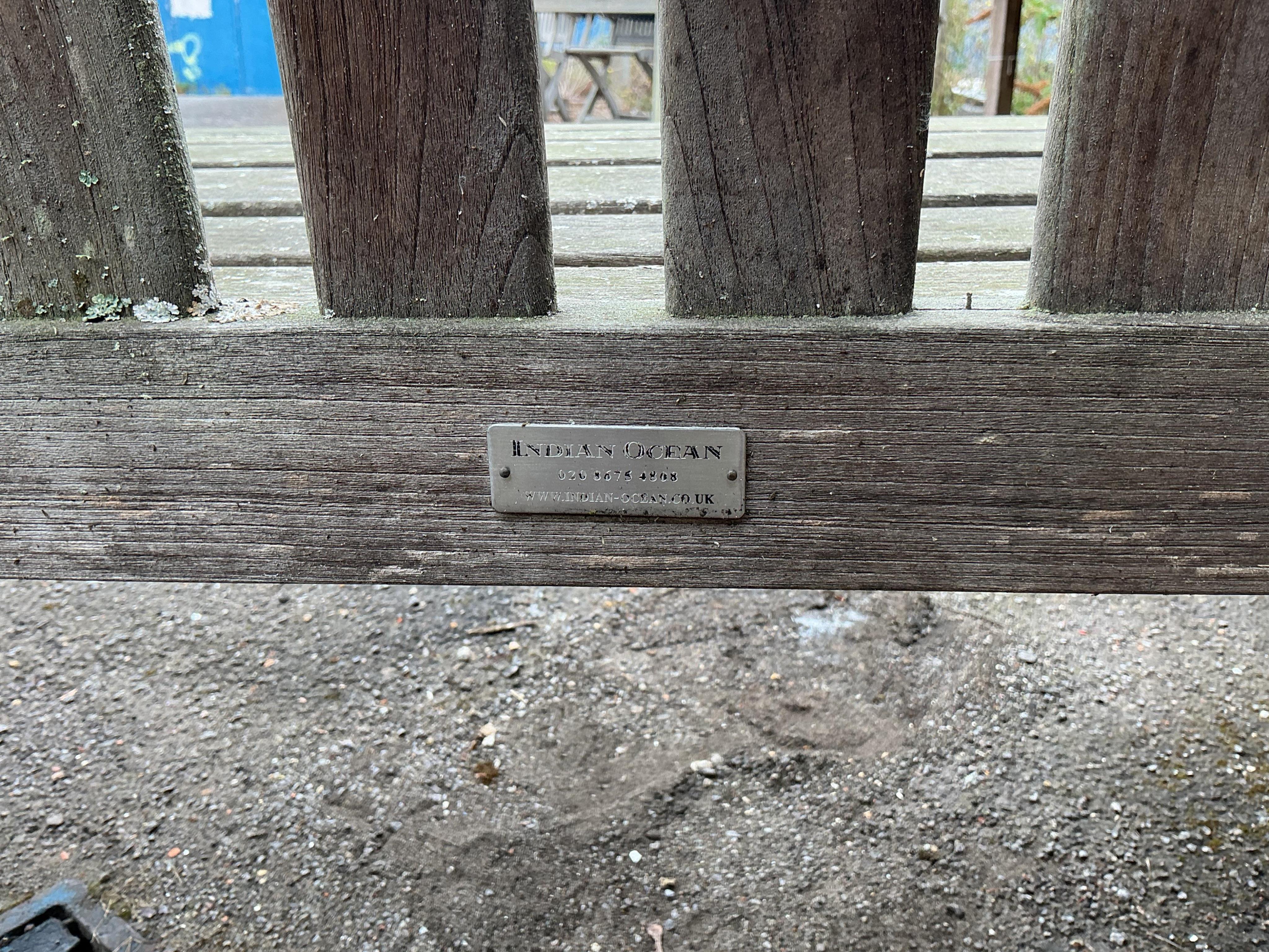 An Indian Ocean Trading Company slatted teak garden bench, width 152cm, depth 61cm, height 86cm